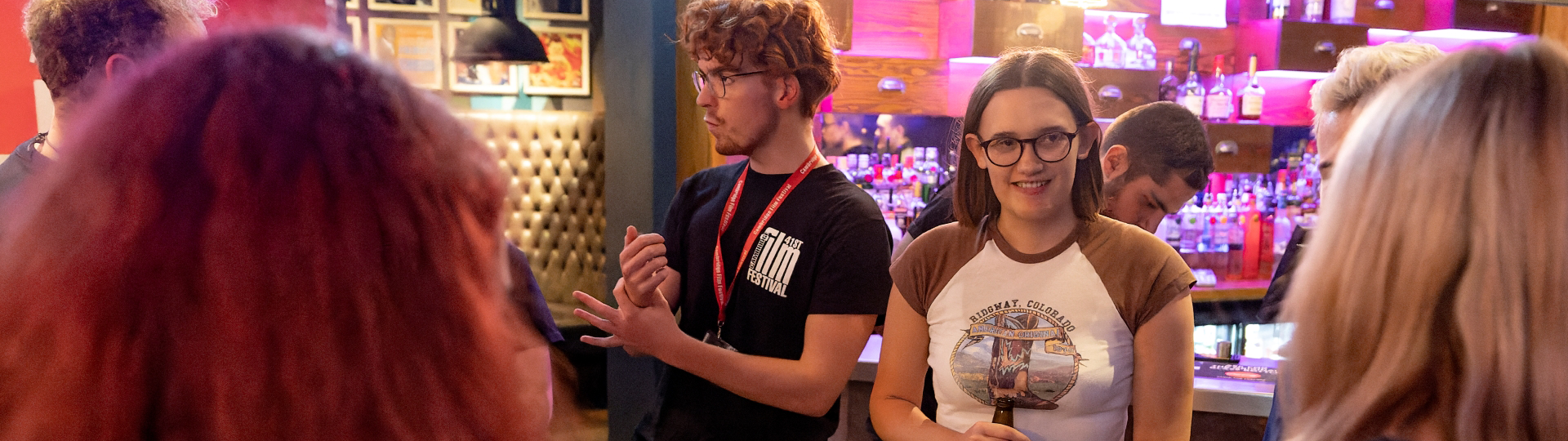 young people networking at a bar