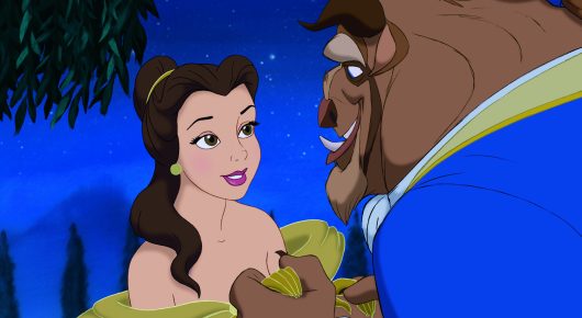 Still from Beauty and the Beast: animated Belle in a gold dress and the Beast stand close together against a deep blue night sky.